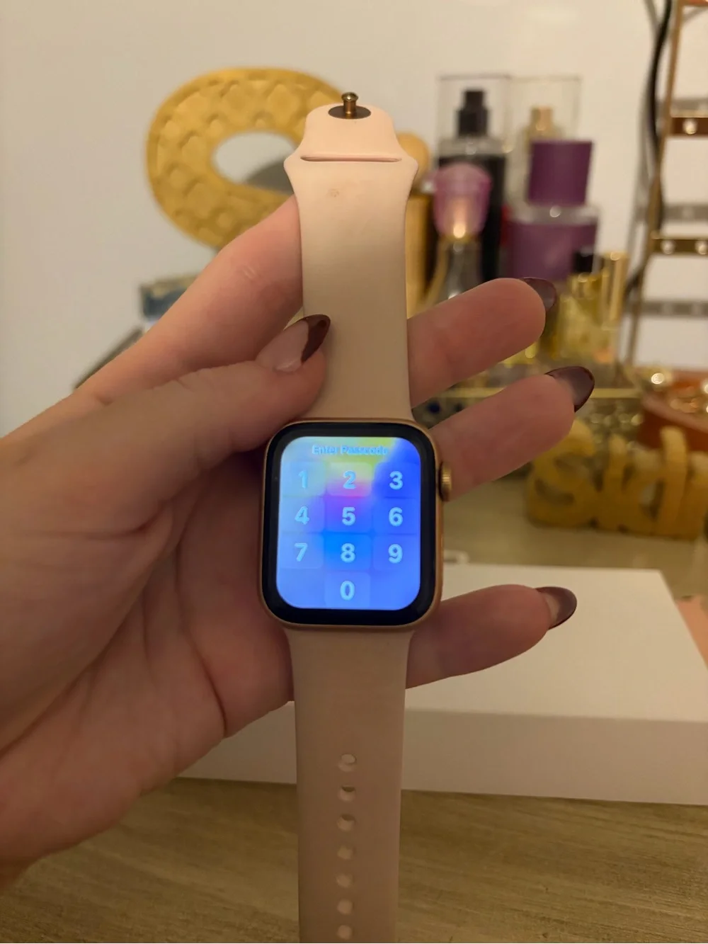 Apple Watch with Pink Sport Band and Multiple Additional Bands